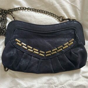 Elegant Black Leather Clutch with Gold Accents